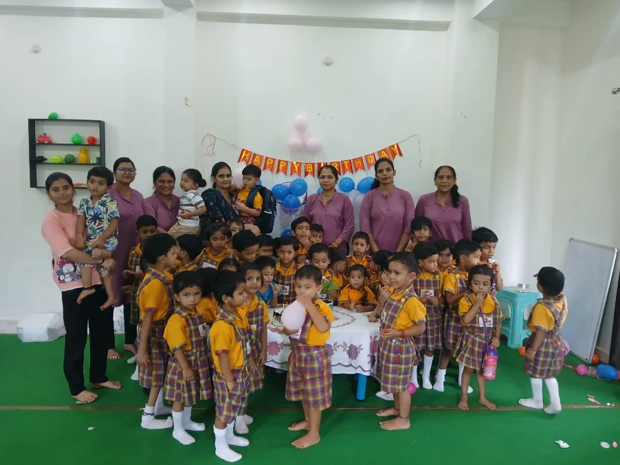 Wonder Bees children and teachers together in the school hall